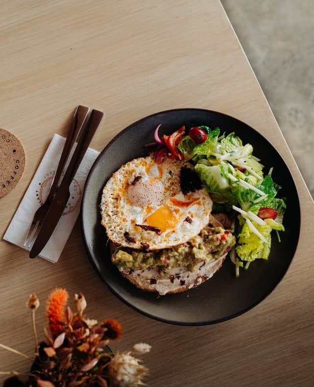 Frilly Eggs on Chargrilled Sourdough & Guacamole